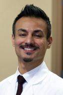 A headshot of Umair Ahmad