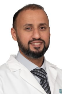A headshot of Ali Malik