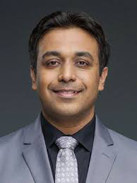 A headshot of Vinoy Singh Prasad
