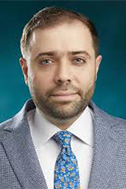 A headshot of Ahmad Al Turk