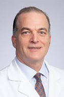 A headshot of John Lopez