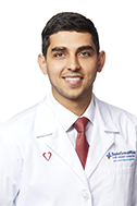 A headshot of Dr. Aqtash