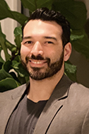 A headshot of Ali Ebrahimi