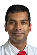 A headshot of Faisal Rahman