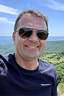 A headshot of Mircea Petrina
