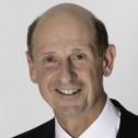 A headshot of Ronald Caputo