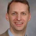 A headshot of Nathaniel Taggart