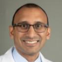 A headshot of Adam Vohra