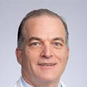A headshot of John Lopez